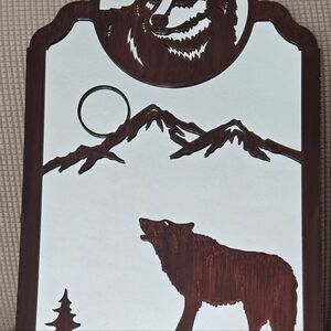 Wolf and mountain mirror.